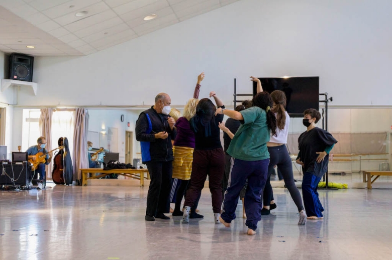 Dancers rehearsing together in a practice studio